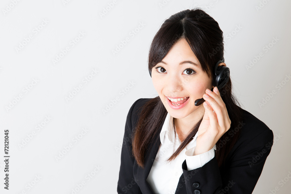 asian businesswoman using headset