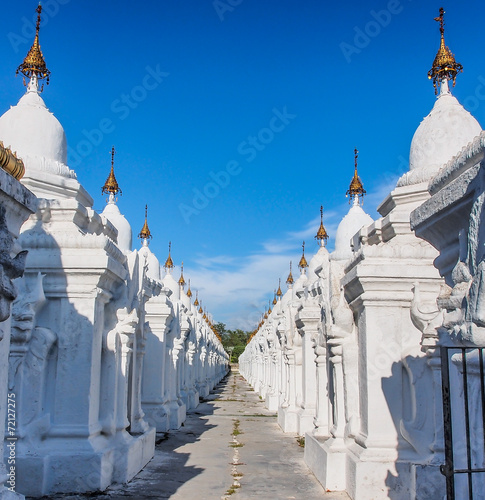 white pagodas in Kuthodaw temple, Mandalay, Myanmar photo