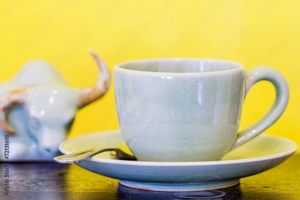 Cup of coffee on yellow background. Cup of coffee on yellow background.