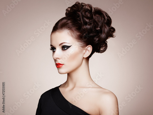 Portrait of beautiful sensual woman with elegant hairstyle