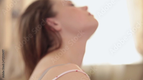 Attractive female in lingerie enjoying partner's delicate touch photo