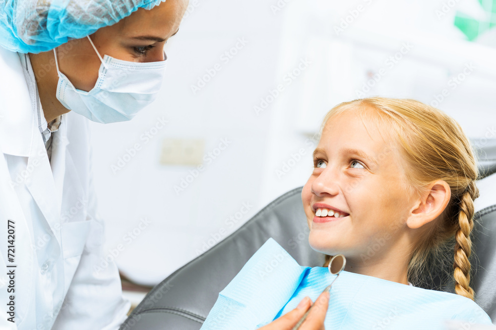 Dentist inspecting patient Dentist inspecting patient