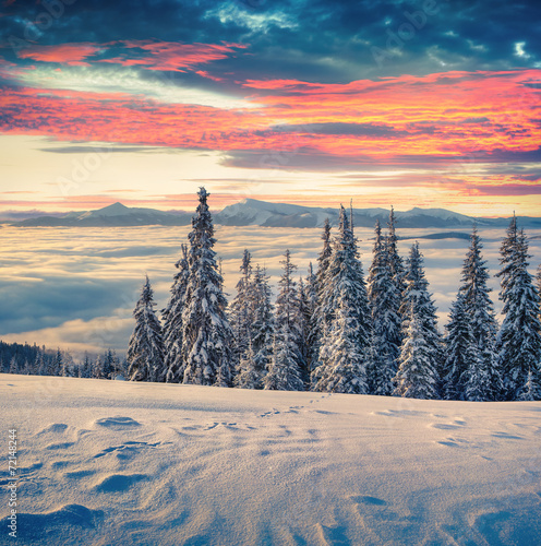 Beautiful winter sunrise in the mountains.
