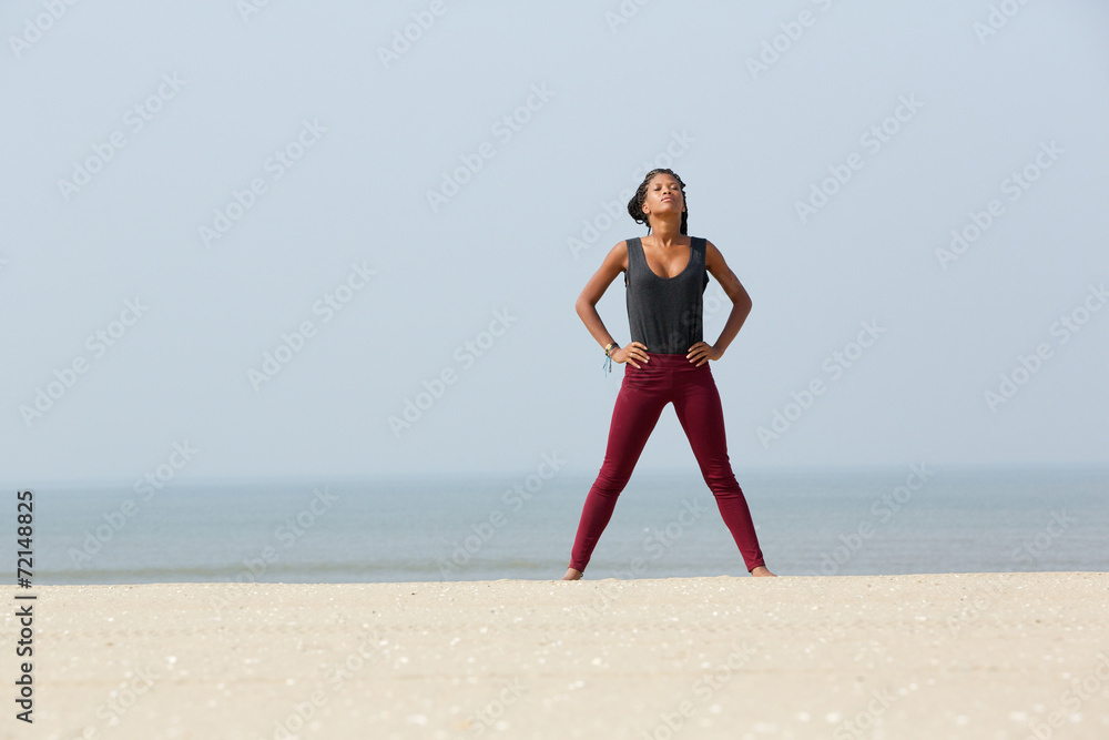 African woman doing yoga breathing exercise African woman doing yoga breathing exercise