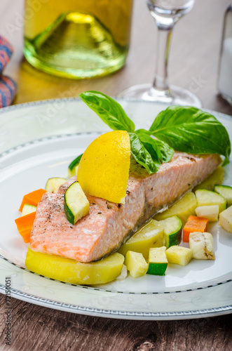 Salon baked in papilota with vegetable photo