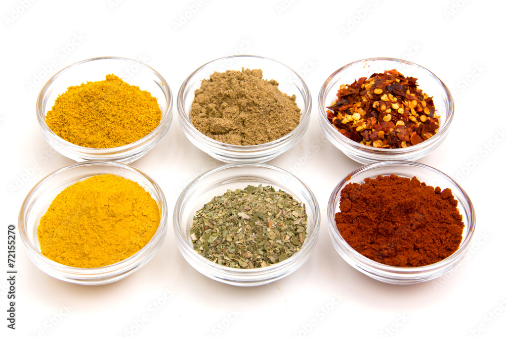 Bowls with some spices on white background Bowls with some spices on white background