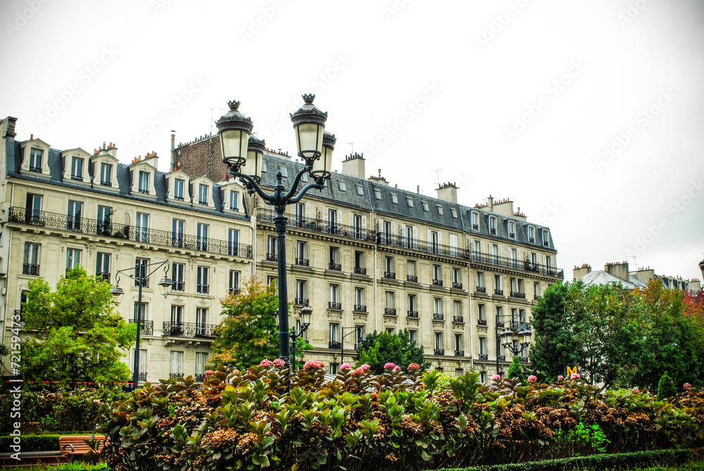 Facade of a traditional building in a street in Paris, France