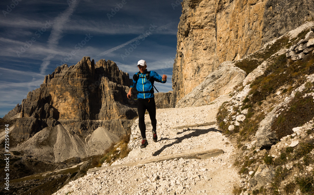Man running in Dolomites