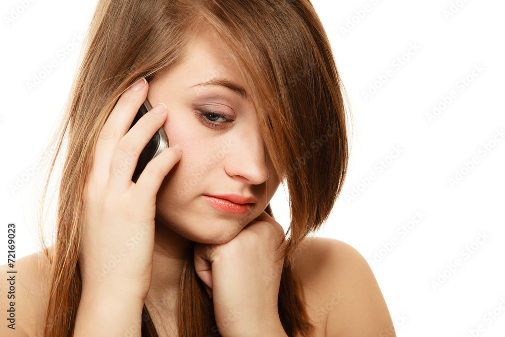 Communication. Sad girl talking on mobile phone Communication. Sad girl talking on mobile phone