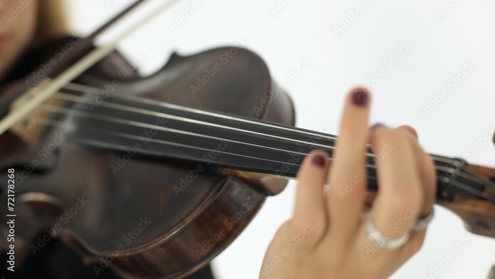 Girl playing the violin with inspiration Girl playing the violin with inspiration