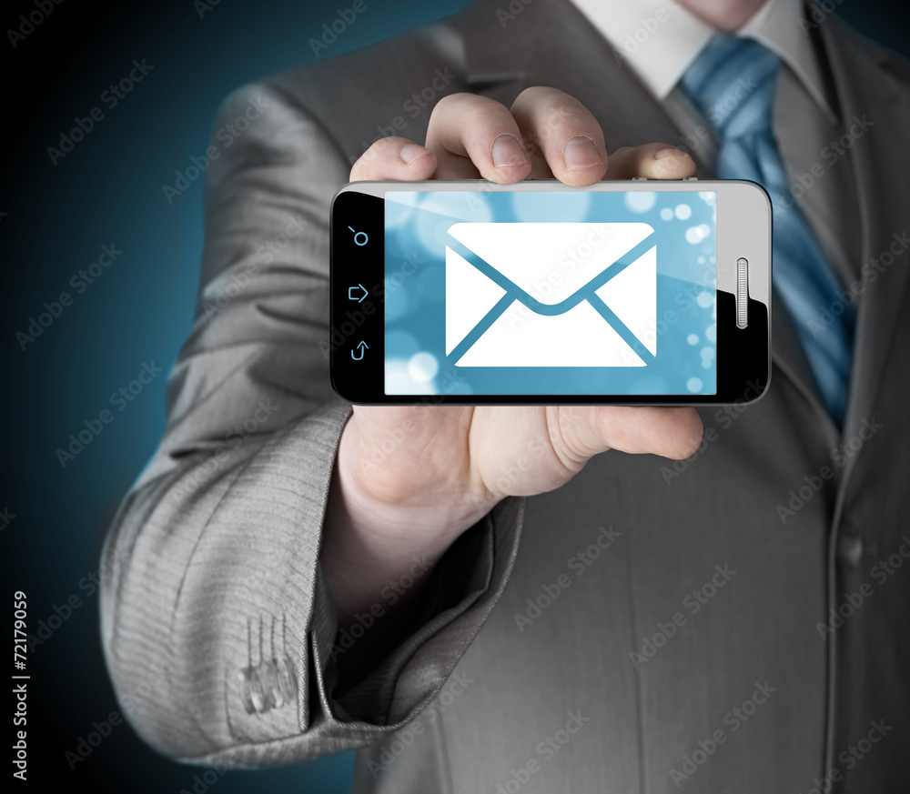 A man holding smartphone with one new message on a screen A man holding smartphone with one new message on a screen