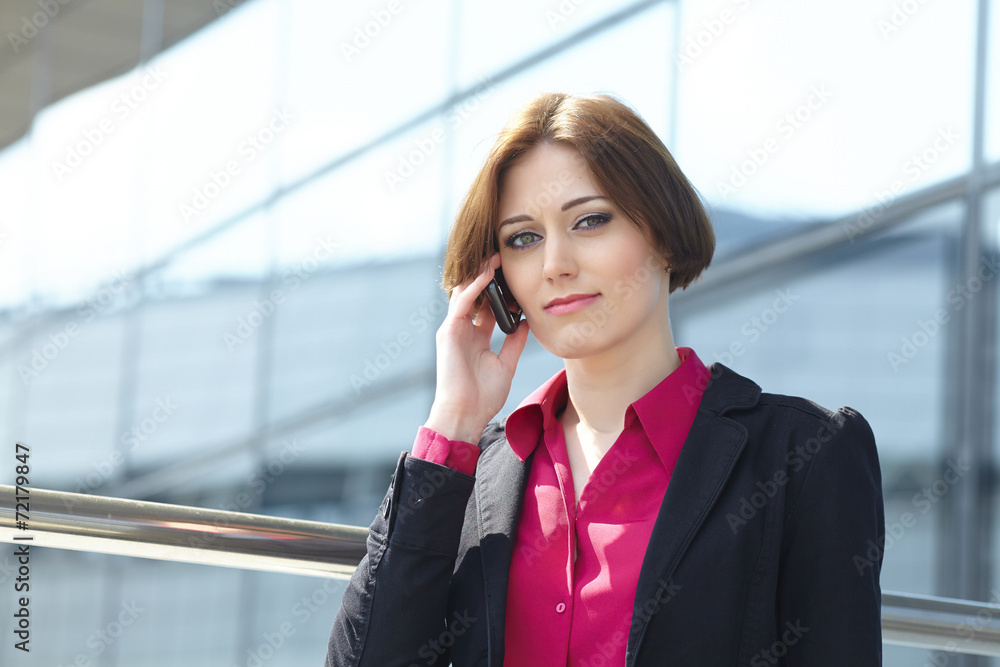 Businesswoman with mobile phone Businesswoman with mobile phone