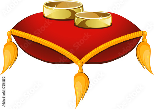 Wedding rings on a red pillow