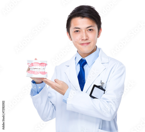 Dentist with denture