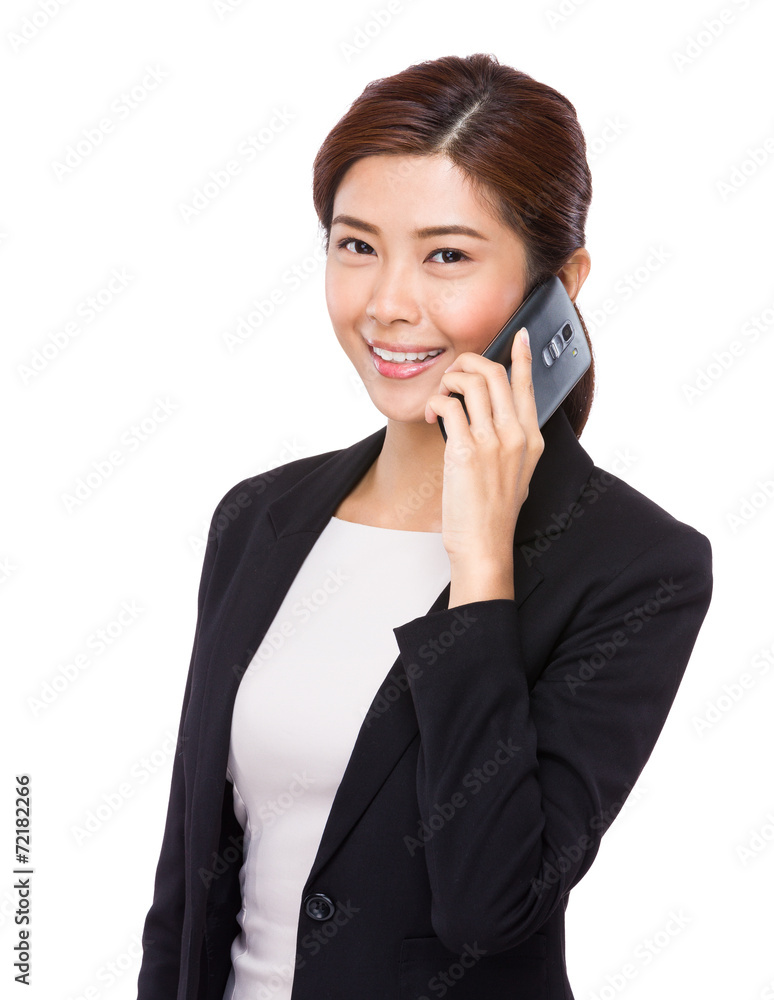 Asian businesswoman chat on cellphone Asian businesswoman chat on cellphone