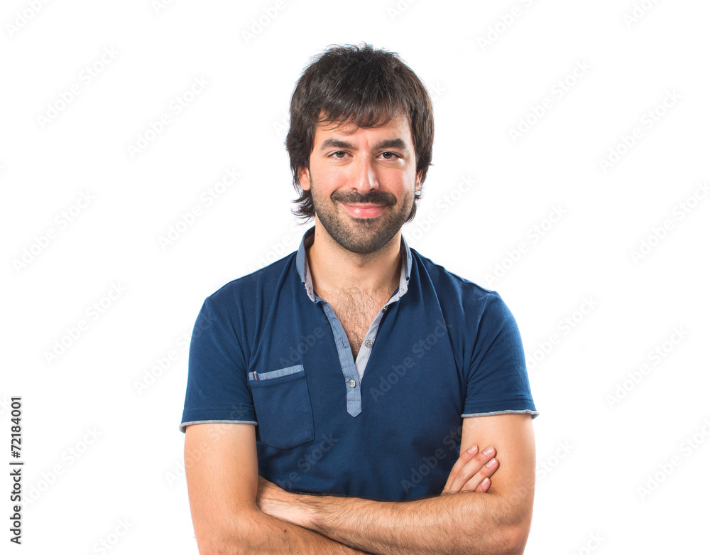 Man with his arms crossed over white background Man with his arms crossed over white background