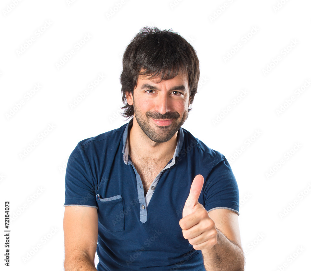 Man with thumb up over white background Man with thumb up over white background