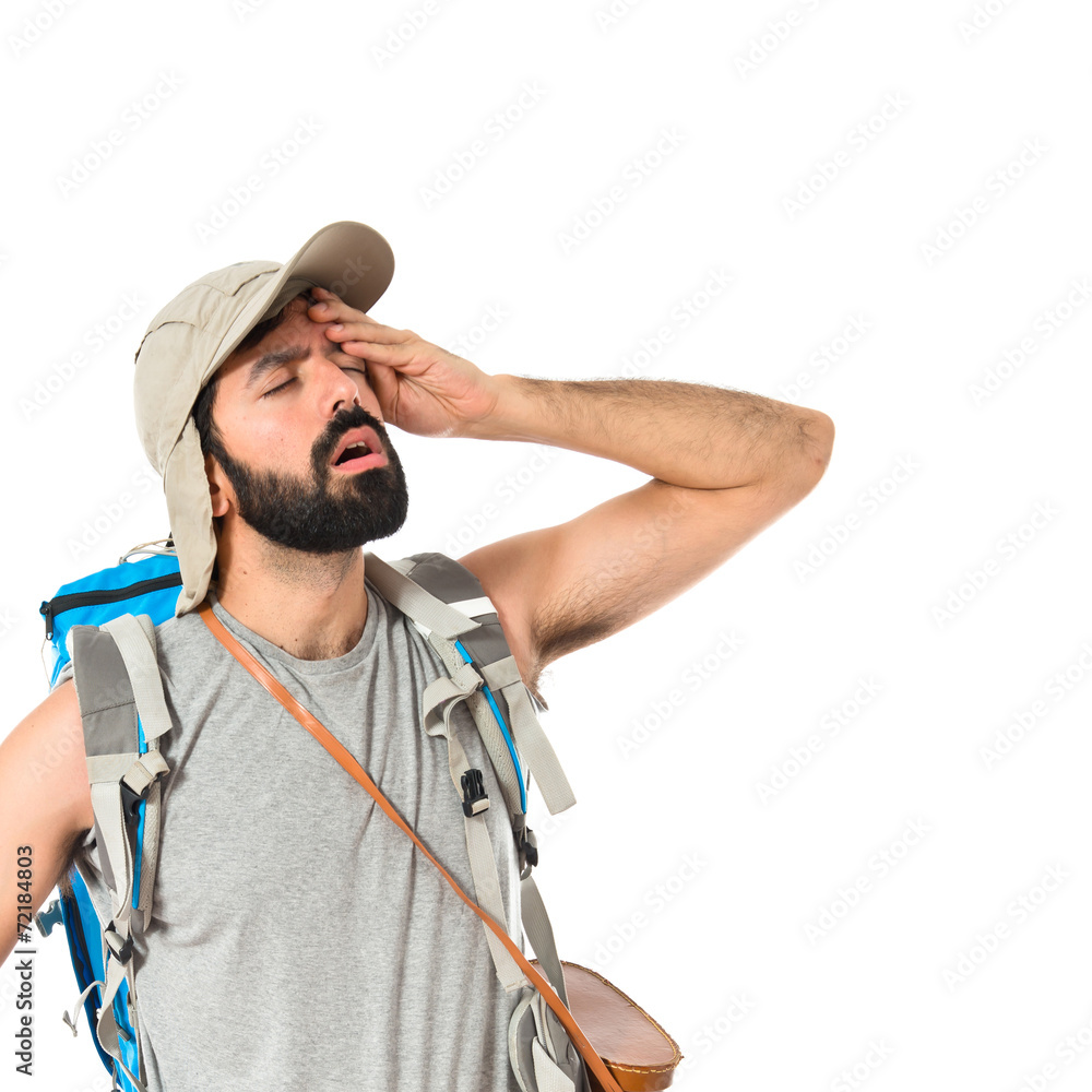 Backpacker thinking over isolated white background Backpacker thinking over isolated white background