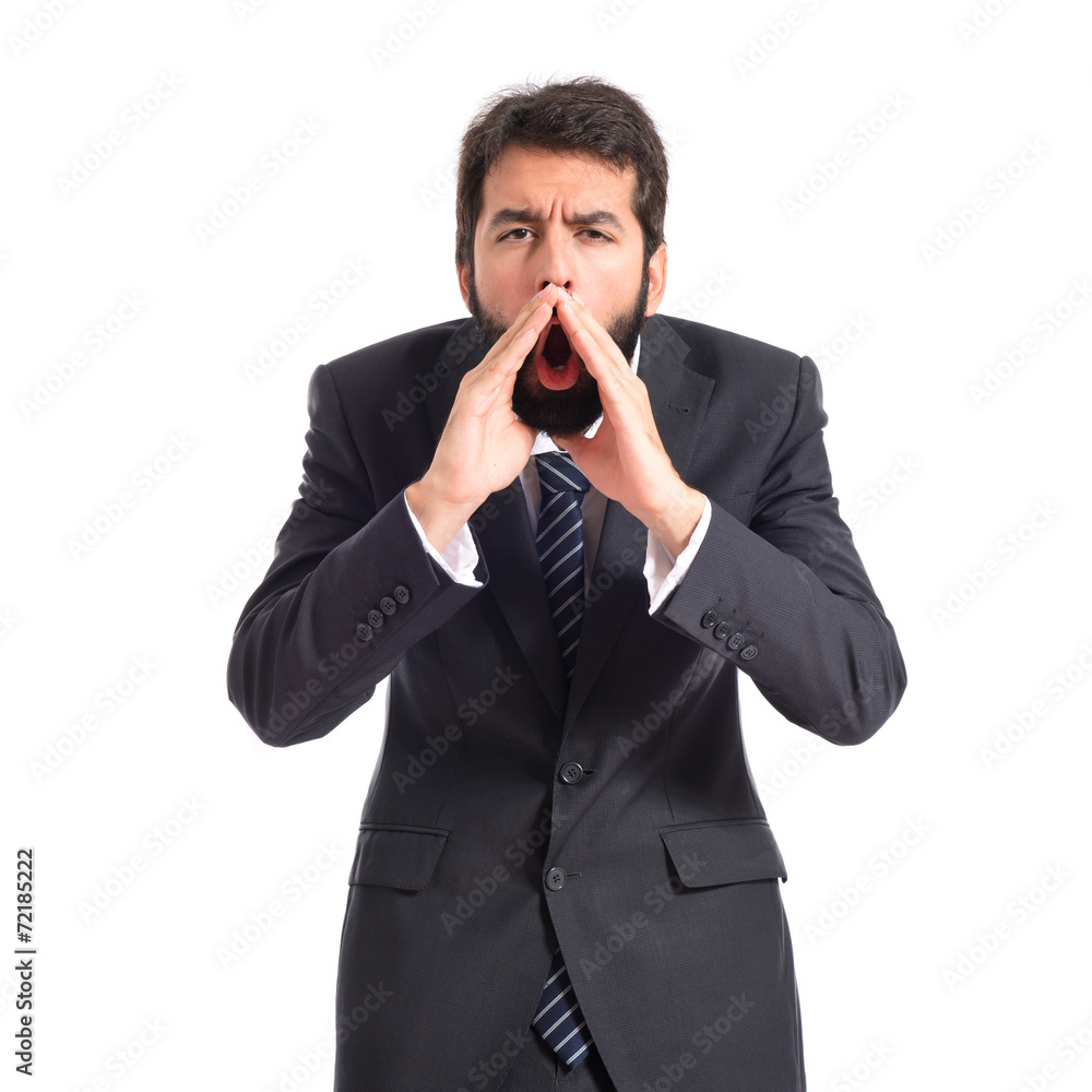 Businessman shouting over isolated white background Businessman shouting over isolated white background