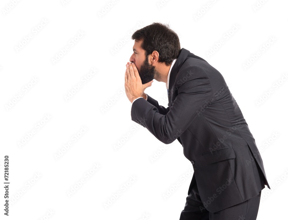 Businessman shouting over isolated white background Businessman shouting over isolated white background