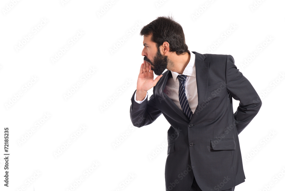 Businessman shouting over isolated white background Businessman shouting over isolated white background