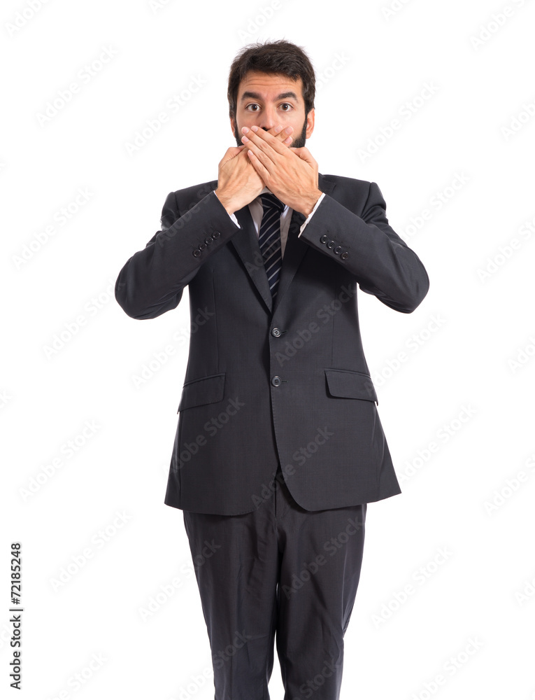 Businessman doing surprise gesture over white background Businessman doing surprise gesture over white background