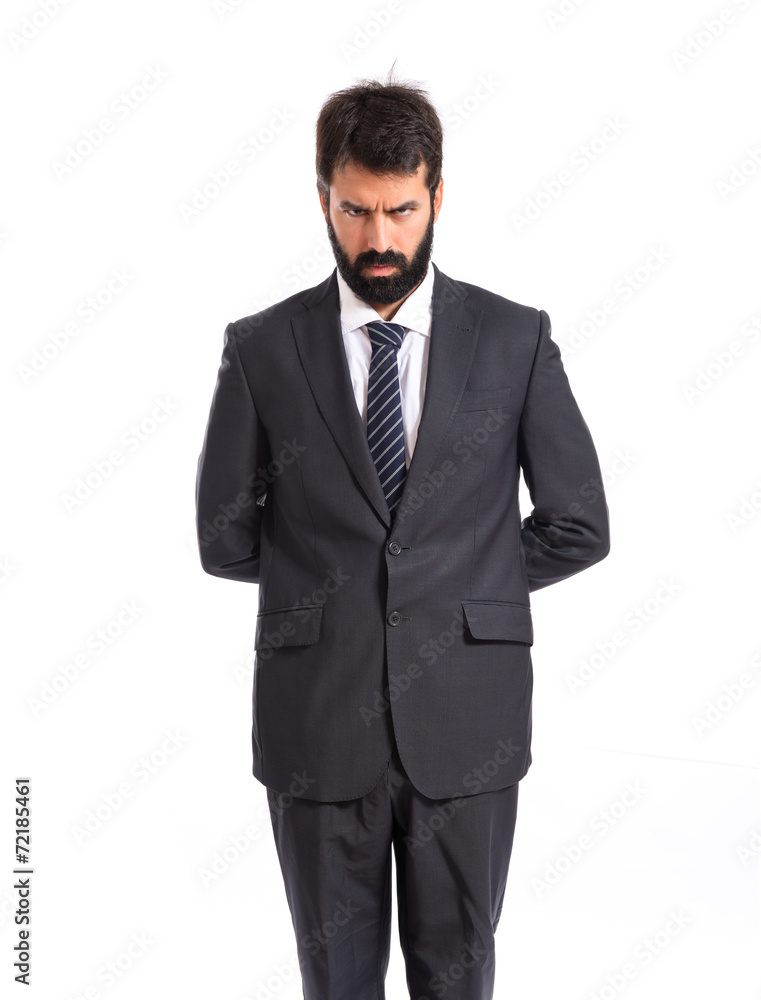 Sad businessman over white background Sad businessman over white background