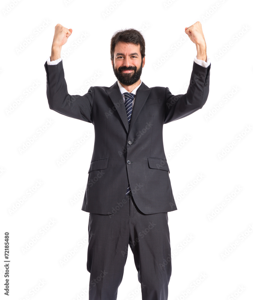 Lucky businessman over isolated white background Lucky businessman over isolated white background