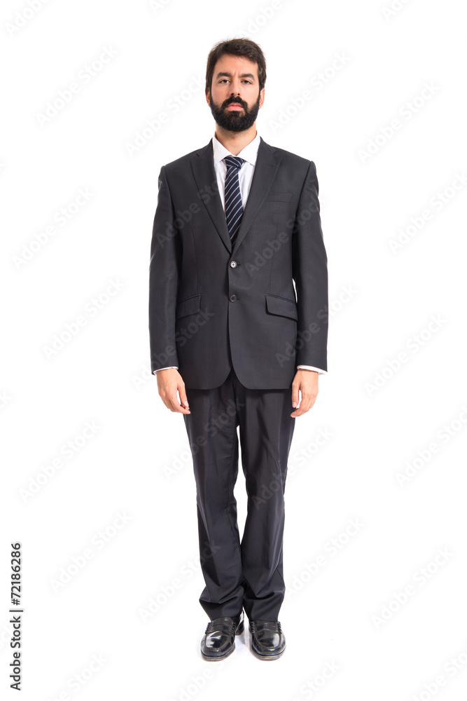 Standing businessman over isolated white background Standing businessman over isolated white background