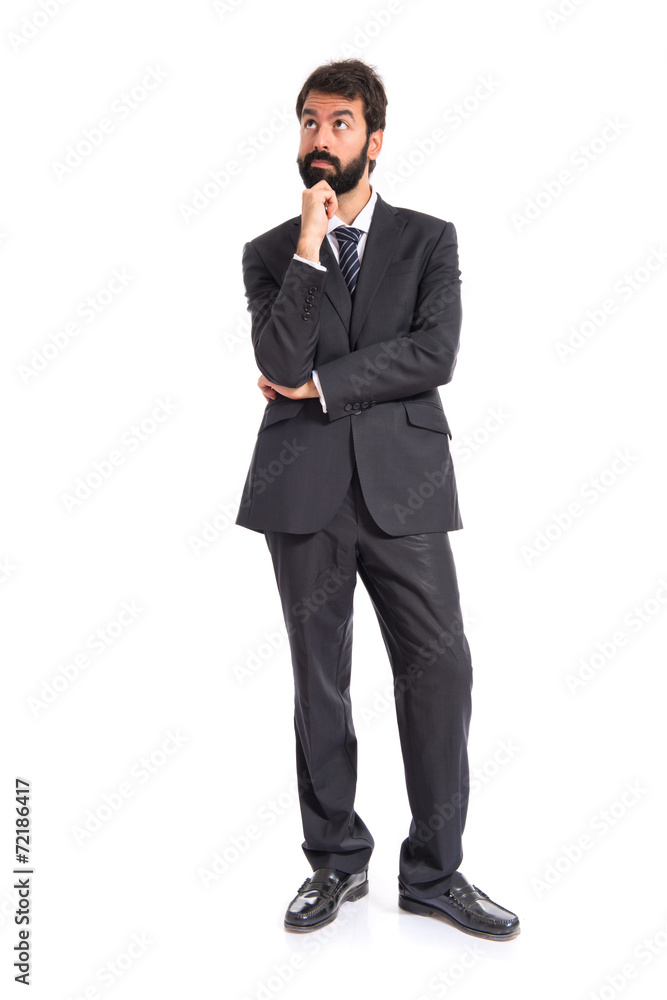 Businessman thinking over isolated white background Businessman thinking over isolated white background