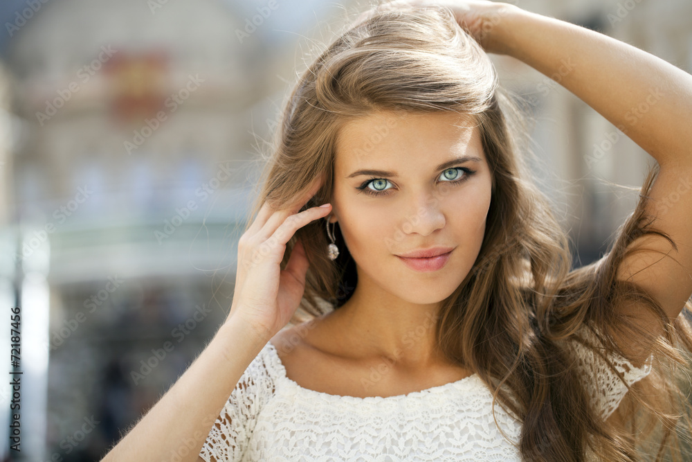Young beautiful woman in white dress Young beautiful woman in white dress