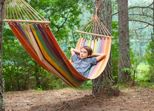 Child in hammock outdoors