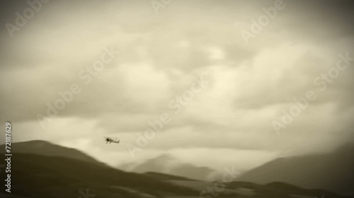 WWII Biplane in the air photo