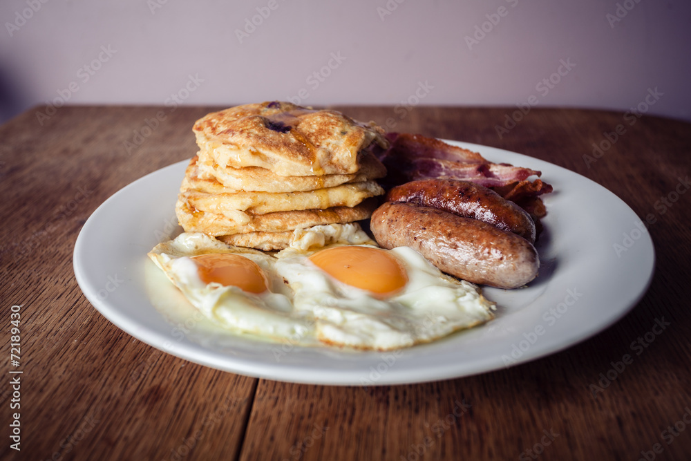 Breakfast with pancakes and bacon Breakfast with pancakes and bacon