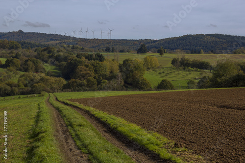 farmland with wind turbines