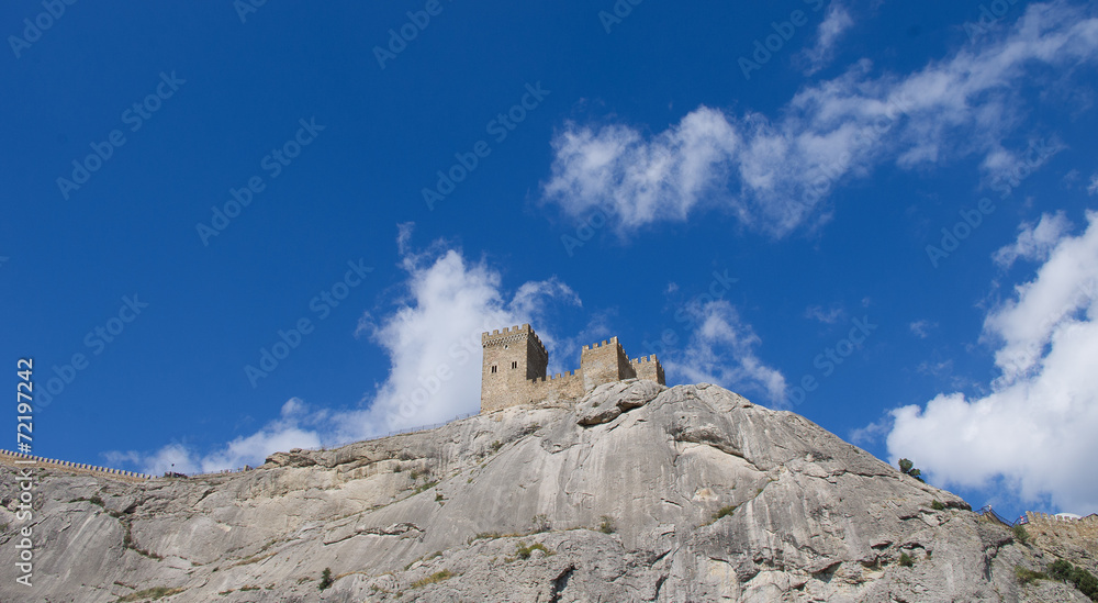 The tower of the ancient castle on a rock