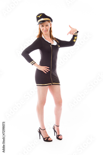 model isolated on plain background pointing to herself