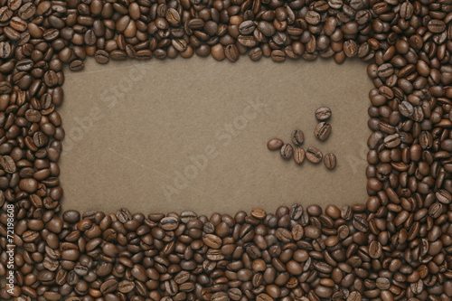 Caffe edition, coffee beans on old brown paper