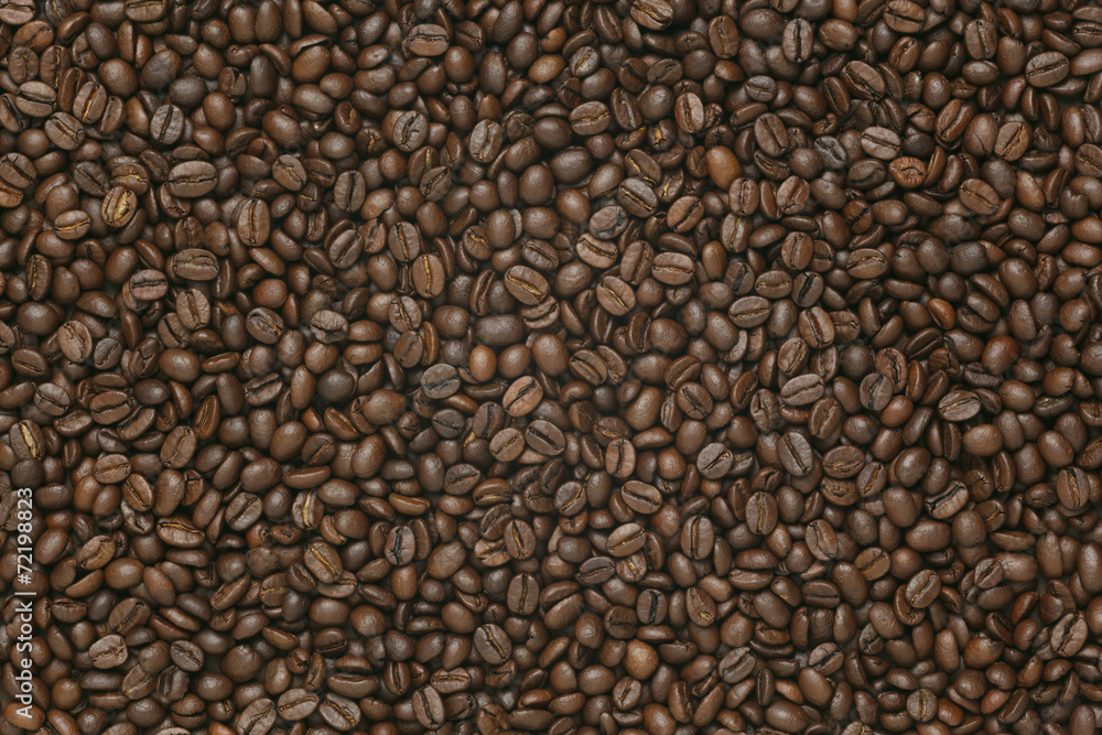 Caffe edition, coffee beans on old brown paper Caffe edition, coffee beans on old brown paper