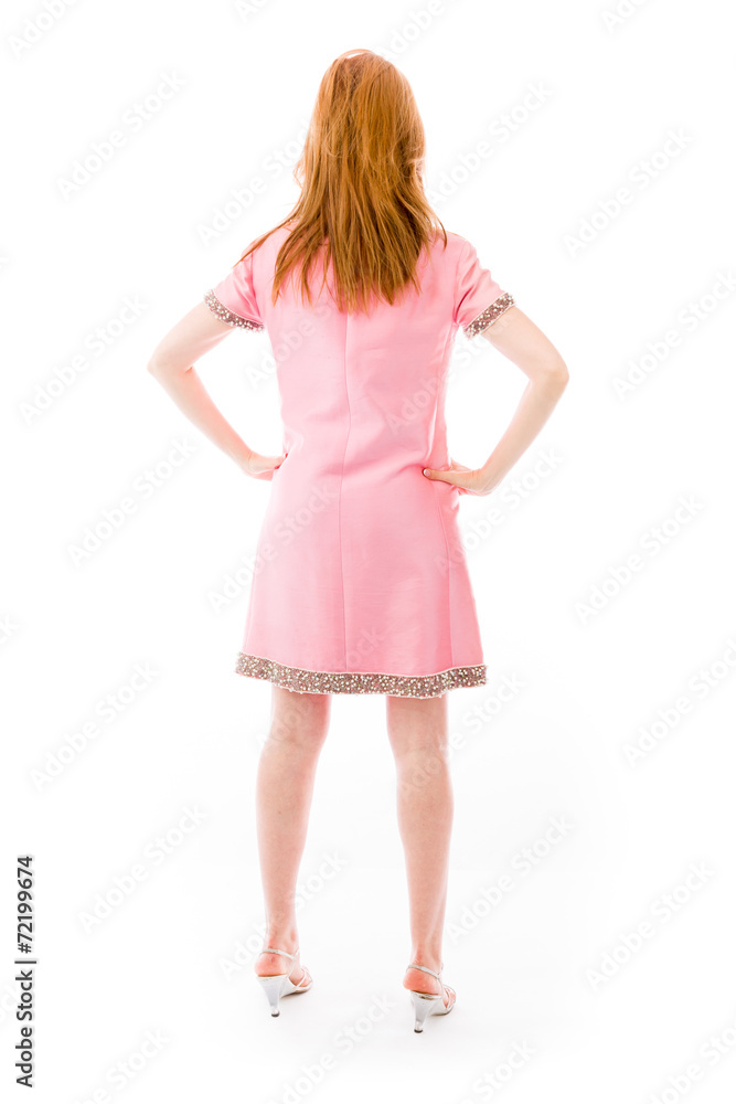 model isolated on plain background back hands on hips