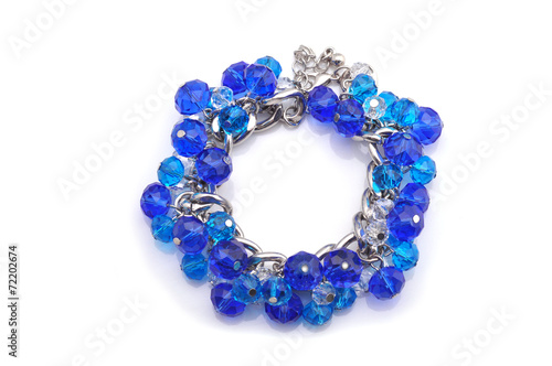 blue bracelet on a white background