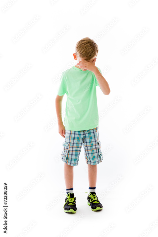 model isolated on plain background ashamed hiding face in hand model isolated on plain background ashamed hiding face in hand