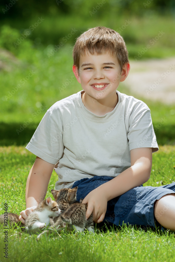Happy little boy with a little cat Happy little boy with a little cat