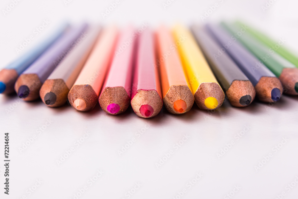 Many different colored pencils on white background Many different colored pencils on white background