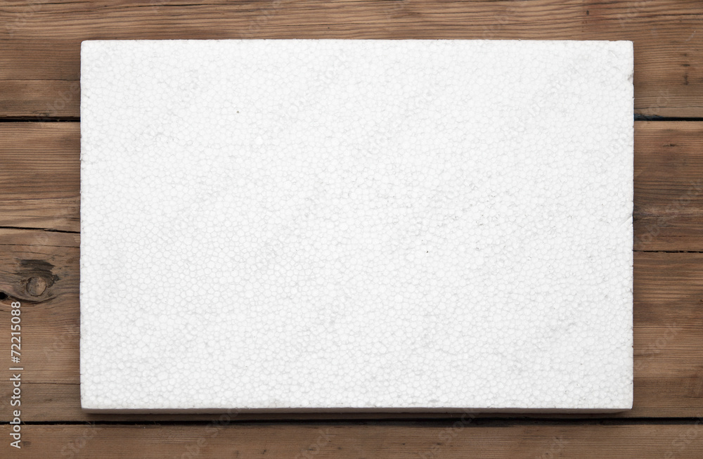 Polyfoam texture on wood background Polyfoam texture on wood background