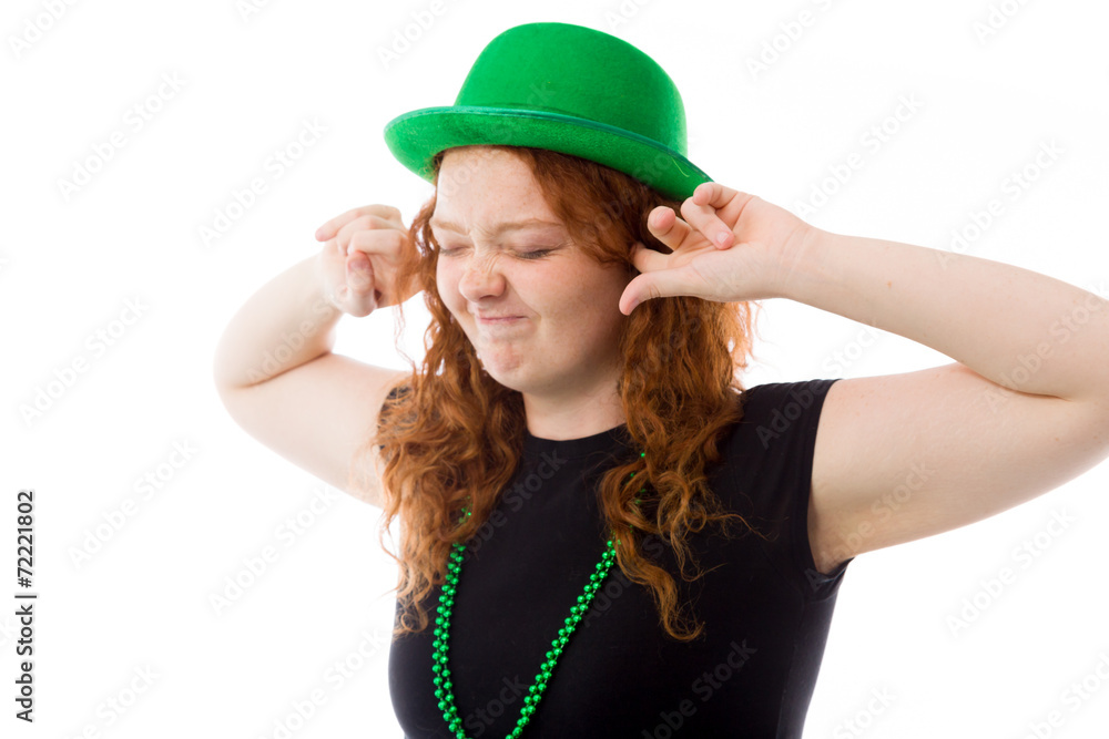 Naklejka premium model isolated on plain background plugging ears with fingers