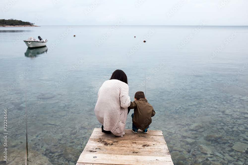 Mother and her son by the sea