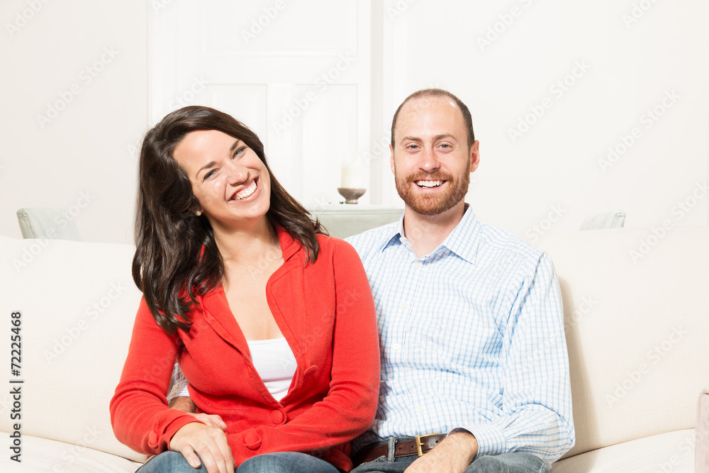 Fototapeta premium Couple having fun in living room