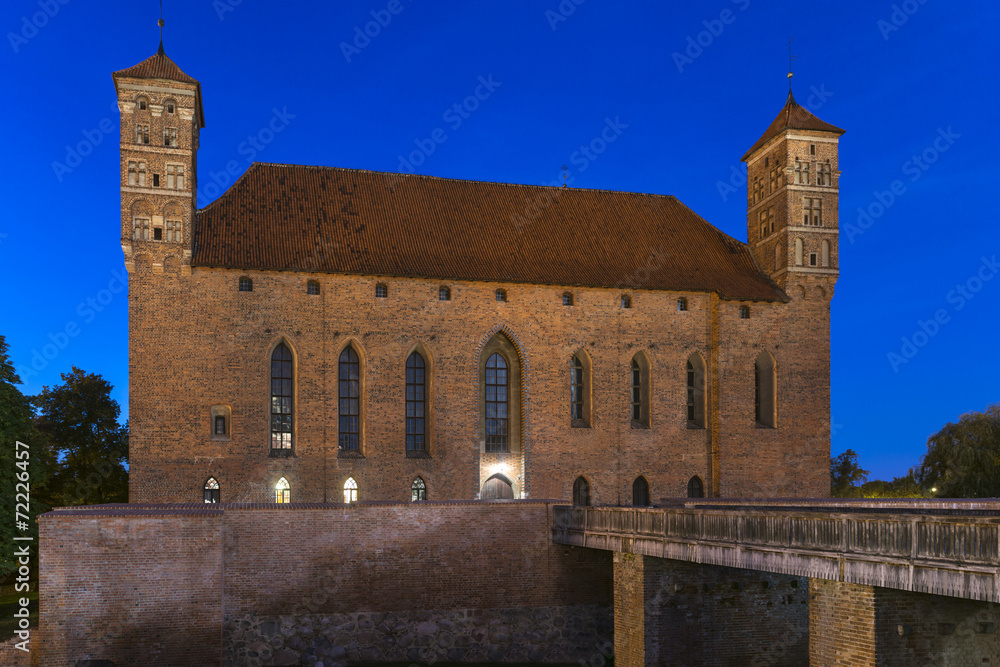 Medieval Gothic castle in Lidzbark Warminski at night