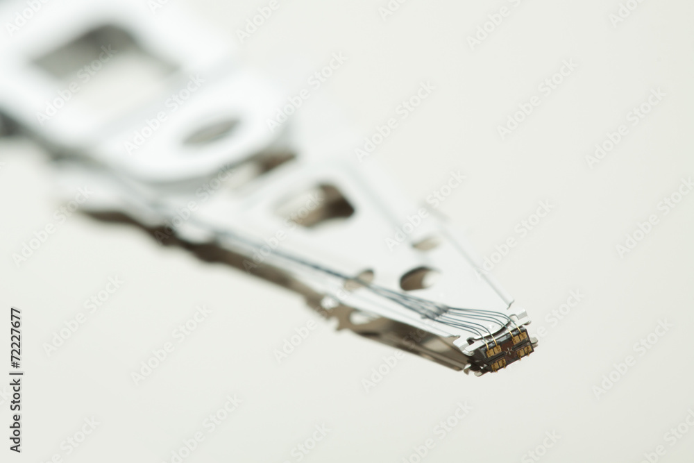 Inside of open and corrupted HDD hard drive disk, narrow focus Inside of open and corrupted HDD hard drive disk, narrow focus